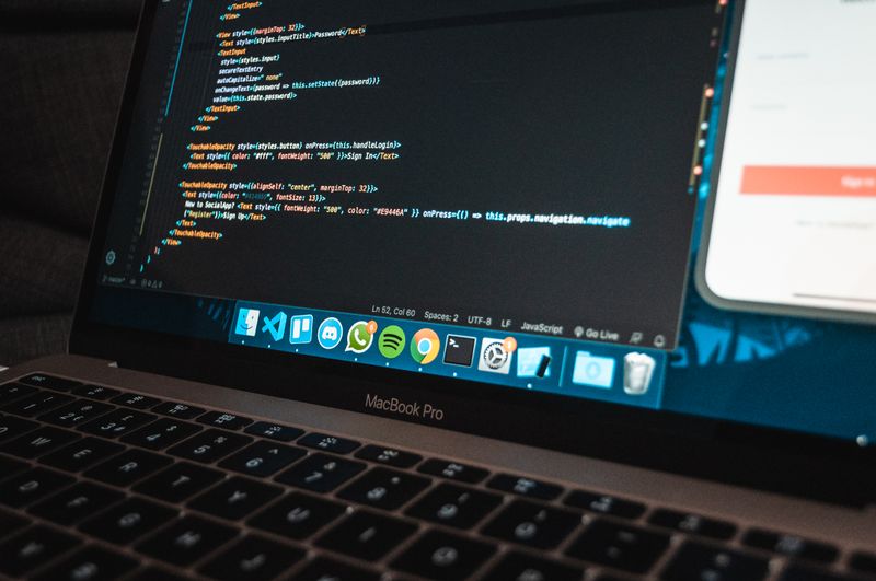 Laptop displaying website code